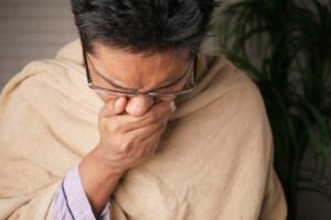 Tuberculosis can spread through coughs or sneezes